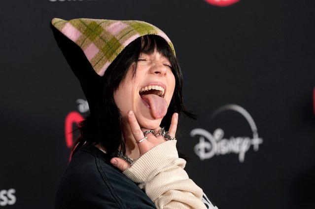 American singer-songwriter Billie Eilish, who co-wrote original songs with her brother Finneas for the animated film “Turning Red”, poses at the world premiere of the film, Tuesday, March 1, 2022, at the El Capitan Theatre in Los Angeles. (Photo by Chris Pizzello/AP Photo)
