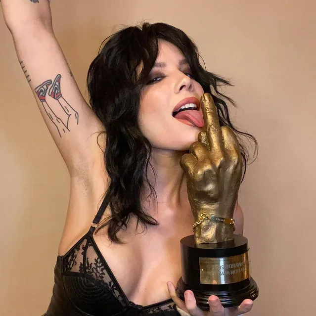 American singer Ashley Nicolette Frangipane, known professionally as Halsey shows off her Innovation Award in early March 2022. (Photo by iamhalsey/Instagram)