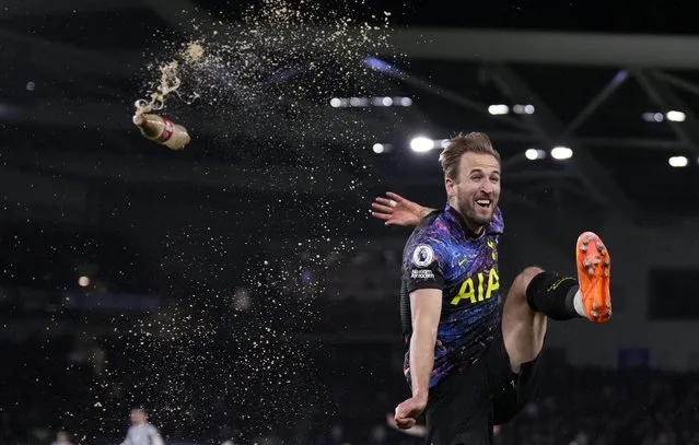 Tottenham's Harry Kane celebrates after scoring his side's second goal during the English Premier League soccer match between Brighton and Tottenham Hotspur at the Falmer stadium in Brighton, England, Wednesday, March 16, 2022. (Photo by Matt Dunham/AP Photo)