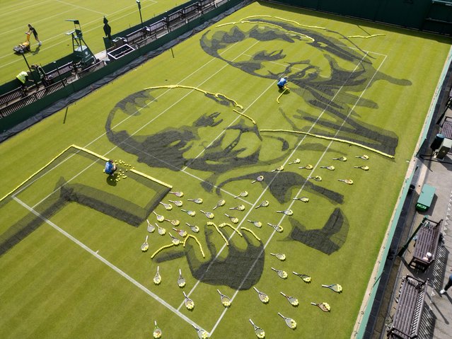 WaterAid and the Wimbledon Foundation on June 11, 2024 took over a tennis court at The All England Lawn Tennis Club to create a giant image entirely from tennis nets, balls and rackets. The water charity says more than 1,000 children’s lives could be saved every day if they had access to toilets and clean water. (Photo by WaterAid/The Times)