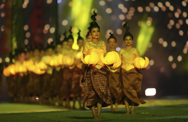 Dancers perform during the opening ceremony of the 32nd South East Asian Games at the Morodok Techo National Stadium, in Phnom Penh, Cambodia, Friday, May. 5, 2023. (Photo by Tatan Syuflana/AP Photo)