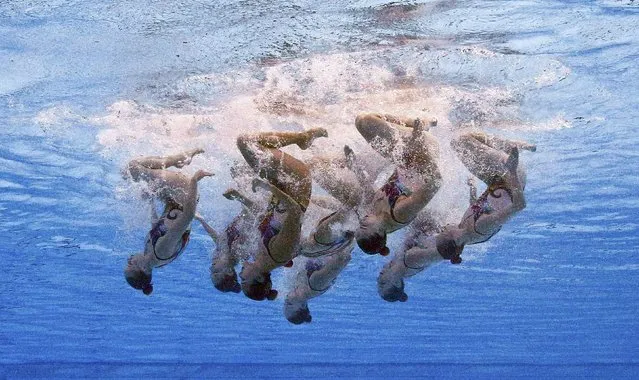 Members of Team Canada are seen underwater as they perform in the synchronised swimming team free routine preliminary at the Aquatics World Championships in Kazan, Russia July 28, 2015. (Photo by Michael Dalder/Reuters)