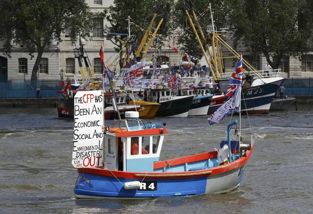 A boat forming part of a flotilla of fishing vessels campaigning to leave the European Union sails up the river Thames in London, Britain June 15, 2016. (Photo by Stefan Wermuth/Reuters)