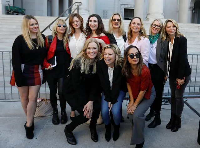The Silence Breakers (L to R) Jessica Barth, Rossanna Arquette, Lauren O'Connor, Caitlin Dulany, Sarah Ann Masse, Louise Godbold, Lauran Sivan, Louisette Geiss, Larissa Gomes, Melissa Sagemiller Nesic and Katherine Kendall pose for a group picture following a news conference on the Harvey Weinstein verdict outside Los Angeles City Hall in Los Angeles, California, U.S. February 25, 2020. (Photo by Mike Blake/Reuters)