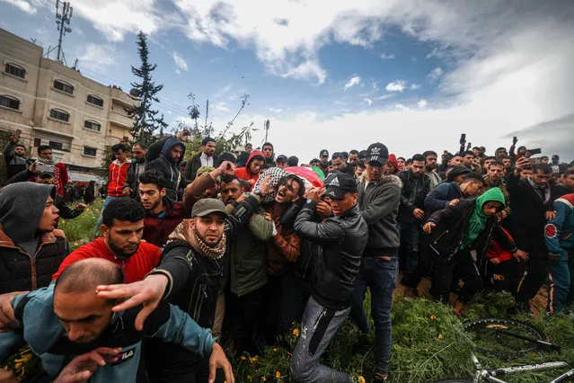 People attend the funeral ceremony of those who lost their lives in a fire broke out at Nuseirat Camp in Gaza City, Gaza on March 06, 2020. At least 9 people died and 53 injured in the incident. (Photo by Ali Jadallah/Anadolu Agency via Getty Images)