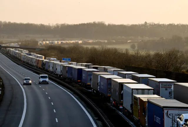 Trucks are jammed in long traffic jam as they wait for border control on the motorway A4 near Bautzen, Germany, 19 March 2020. Due to the border closing, among measures to contain the spread of coronavirus, between Poland and Germany trucks waiting in 60km long traffic jam for border control. The German government and local authorities are heightening measures to stem the spread of the coronavirus SARS-CoV-2 which causes the COVID-19 disease. According to the disease control centre of the Robert Koch Institute, the number of coronavirus cases in Germany has exceeded over 10,000 mark on 18 March 2020. (Photo by Filip Singer/EPA/EFE)