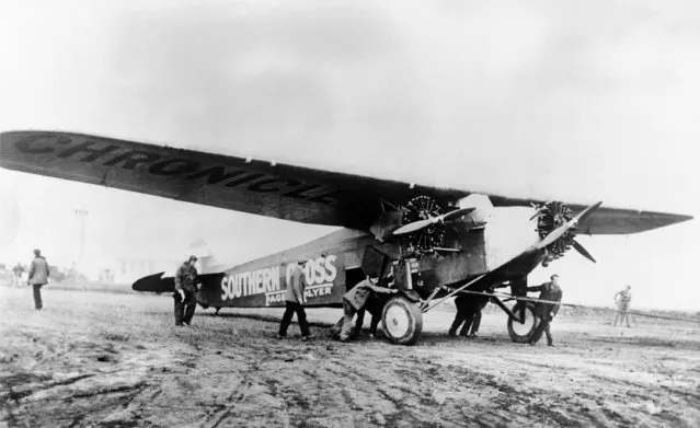 The Southern Cross being towed out onto the airfield at Oakland, Ca., on June 8, 1928, before setting off to Australia. Captain Charles Kingsford Smith and Charles Ulm will be attempting the 7,500 mile record flight. (Photo by AP Photo)