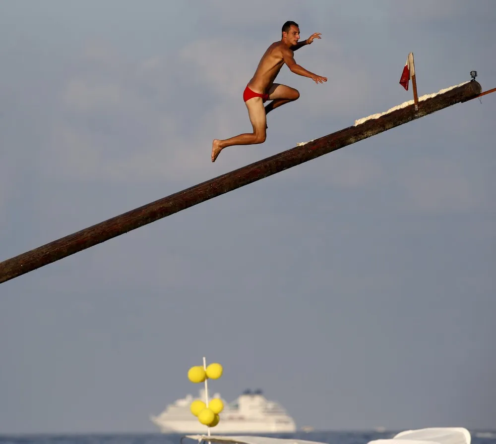 The Game of Gostra – Running Up a Greasy Wooden Pole in Malta