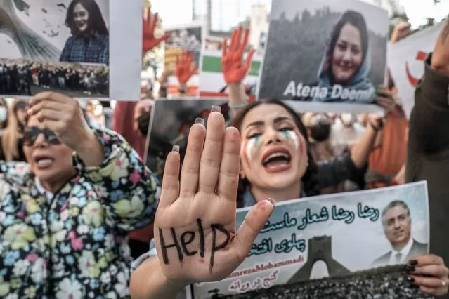 Protests in Iran, which started with the death of 22-year-old Mahsa Amini after being detained on the grounds that she did not comply with the headscarf rules, continue at the Iranian consulate on October 24, 2022 in İstanbul, Turkey. (Photo by Ozan Güzelce/ dia images via Getty Images)