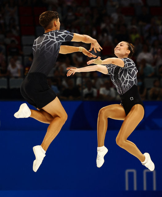 Mara Dragomir and Madalin Boldea, a pair of Romanian gymnasts, perform during the mixed pairs qualification at the World Games in Chengdu, China on August 15, 2025. (Photo by Edgar Su/Reuters)
