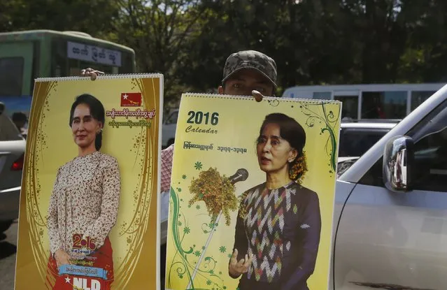 A man sells Aung San Suu Kyi calendars ahead of Sunday's general election in Yangon, Myanmar, November 5, 2015. (Photo by Olivia Harris/Reuters)