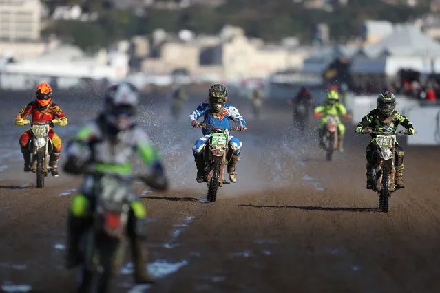 Competitors power down the beach at the 2016 HydroGarden Weston Beach Race in Weston- super- Mare, south west England, on October 8, 2016. (Photo by Andrew Matthews/PA Wire)