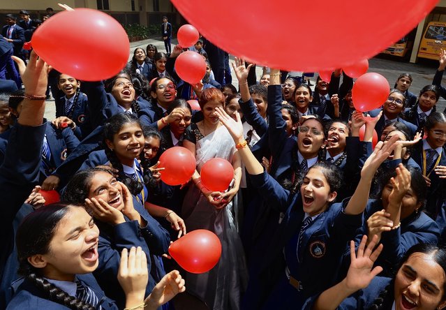 Indian school children and teachers take part in Teachers' Day celebrations at Sri Krishna International School in Bangalore, India, 05 September 2025. Teachers' Day is celebrated in India on 05 September every year to mark the birth anniversary of Dr. Sarvepalli Radhakrishnan, a scholar, philosopher, and the second President of India. The day is observed to express gratitude to teachers for their dedication, guidance, and support, and for their invaluable contributions to education and personal development. (Photo by Jagadeesh N.V./EPA)