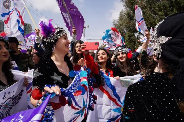 People with traditional clothes march as they attend the celebrations to mark 6773rd Akitu Festival in Duhok, Iraq on April 1, 2023. The Assyrian and Babylonian Akitu festival, celebrated in a period of thousands of years, symbolizes the arrival of the spring. (Photo by Ismael Adnan Yaqoob/Anadolu Agency via Getty Images)