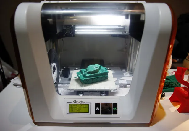 The XYZprinting da Vinci Jr. 3-D printer is on display at CES Unveiled, a media preview event for CES International, Sunday, January 4, 2015, in Las Vegas. (Photo by John Locher/AP Photo)