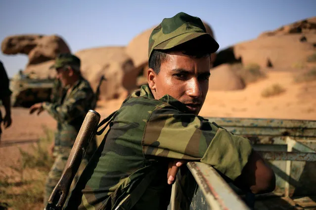 Barra Mebarak, 22, a fighter who joined the Polisario forces in 2012, is seen at a forward base on the outskirts of Tifariti, Western Sahara, September 9, 2016. (Photo by Zohra Bensemra/Reuters)