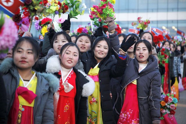 People welcome North Korea's weightlifters including gold medalists at the International Weightlifting Federation (IWF) World Championships as they arrive at Pyongyang International Airport in Pyongyang, North Korea, Thursday, December 19, 2024. (Photo by Jon Chol Jin/AP Photo)