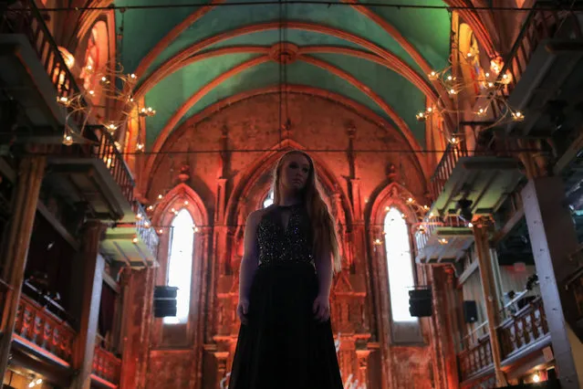 Model Madeline Stuart stands on a runway during a rehearsal at the Angel Orensanz Foundation during New York Fashion Week in New York City, U.S., September 9, 2018. (Photo by Andrew Kelly/Reuters)