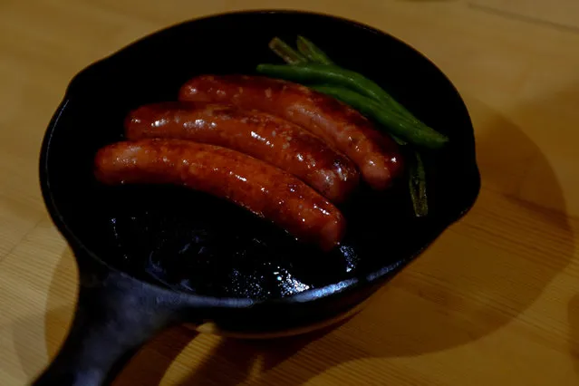 Boar sausages are seen in a pan in the restaurant of hunter Fujiko Nagata in Hakusan, Ishikawa Prefecture, Japan, November 15, 2016. (Photo by Thomas Peter/Reuters)