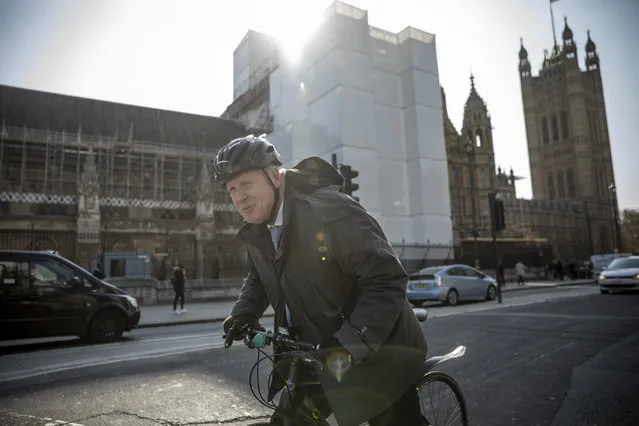 MP Boris Johnson cycles into Westminster on April 1, 2019 in London, England. MPs in Parliament will vote on alternative arrangements for Brexit in a series of indicative votes tonight after Mrs May's deal was defeated for a third time in the House of Commons last week. (Photo by Dan Kitwood/Getty Images)