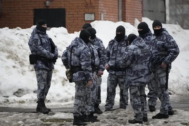 Riot police officers guard the area near the Church of the Icon of the Mother of God Soothe My Sorrows, in Moscow, Russia, Friday, March 1, 2024. Relatives and supporters of Alexei Navalny are bidding farewell to the opposition leader at a funeral in southeastern Moscow, following a battle with authorities over the release of his body after his still-unexplained death in an Arctic penal colony. (Photo by AP Photo)