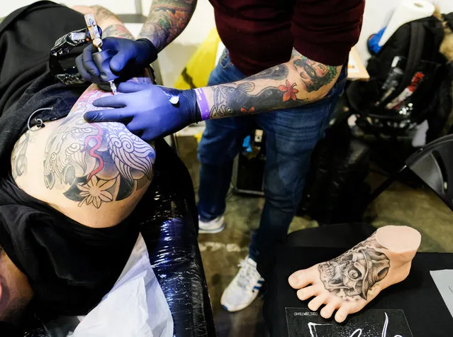 A man has his shoulder tattooed during the Big North Tattoo Show at the Utilita Arena on April 27, 2019 in Newcastle upon Tyne, England. Over 300 of the best tattoo artists attended the event that is the largest of it’s kind ever seen in the North East and one of the biggest in the country. Along with live tattooing opportunities a range of entertainment was on offer including live music and trade stands. (Photo by Ian Forsyth/Getty Images)