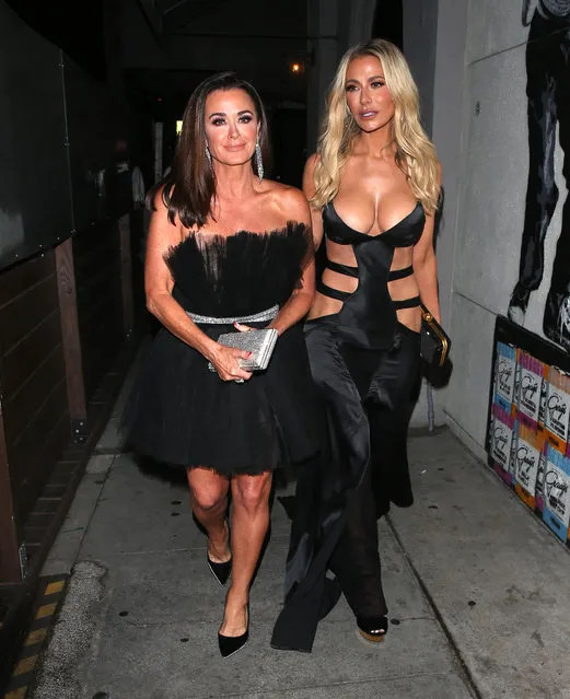 American fashion designer Dorit Kemsley bares it all in a cut out designer dress showing off her incredible figure while leaving dinner with fellow Real Housewives of Beverly Hills Star, Kyle Richards. The ladies enjoyed dinner together at Craigs Restaurant in West Hollywood, CA. on December 7, 2021. (Photo by The Mega Agency)
