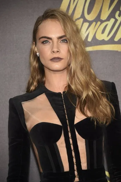 Model Cara Delevingne arrives at the 2016 MTV Movie Awards in Burbank, California April 9, 2016. (Photo by Phil McCarten/Reuters)