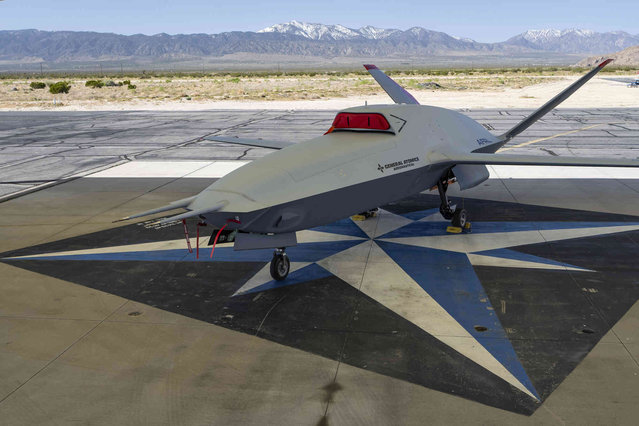 The XQ-67A Off-Board Sensing Station (OBSS), one prototype of the future AI drone fleet developed under the USAF's Air Force Research Laboratory (AFRL) is displayed at General Atomics' test facility at General Atomics' test facility at General Atomics' test facility at Gray Butte in Palmdale, Calif., on Wednesday, May 1, 2024. The uncrewed aerial vehicle (UAV) XQ-67A is developed by General Atomics Aeronautical Systems (GA-ASI) as part of the USAF's Off-Board Sensing Station (OBSS) program. (Photo by Damian Dovarganes/AP Photo)