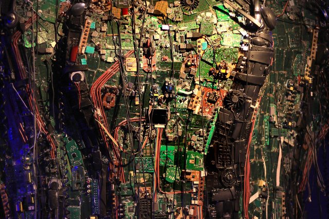 A part of a conceptual tree sculpture developed with electronic waste material under the title “Bodhi Tree” by Indian visual artist Sanatan Dinda is on display at the Academy of Fine Arts in Kolkata, Eastern India, 15 July 2024. The exhibition is a reminder of the impact of e-waste on our planet and lives. The exhibition runs from 13 to 19 July 2024. (Photo by Piyal Adhikary/EPA/EFE)