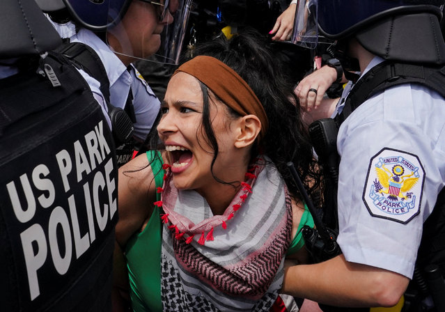 Police detain a pro-Palestinian demonstrator, on the day of Israeli Prime Minister Benjamin Netanyahu's address to a joint meeting of Congress, on Capitol Hill in Washington, U.S., July 24, 2024. (Photo by Nathan Howard/Reuters)