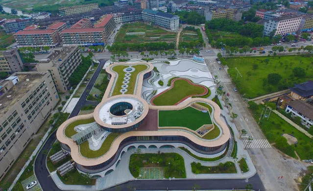 Aerial view of bone shaped halls of Pingyang pet product town Pingyang County on May 17, 2017 in Wenzhou, Zhejiang Province of China. Pingyang pet product town owns 22 enterprises who product pet toys and pet foods at Shuitou Town in Wenzhou. (Photo by VCG/VCG via Getty Images)