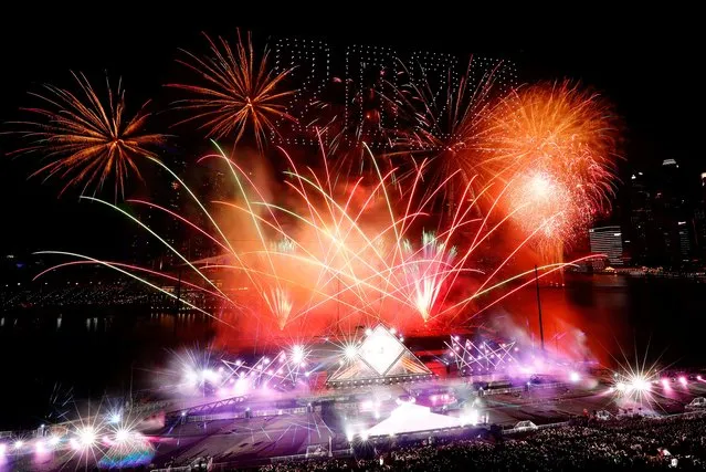 Fireworks explode over Marina Bay during New Year's Eve celebrations in Singapore on January 1, 2020. (Photo by Edgar Su/Reuters)