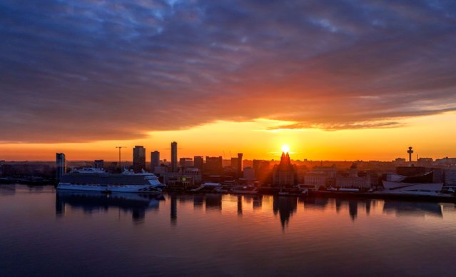 The sun rises over crusie ship Regal Princess as it moors on the River Mersey in Liverpool on Monday, June 24, 2024. (Photo by Peter Byrne/PA Images via Getty Images)