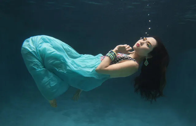 The Sun magazine's under water fashion shoot with resort style clothes, March 25, 2014. (Photo by Lloyd Fox/Sun Photographer)