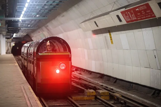 Mail Rail train driver Penelope Veck drives through the underground eastbound Mount Pleasant Sorting Office station on July 28, 2017 in London, England. The Postal Museum opens to the public today and features artefacts from 500 years of postal history. Mail Rail, which opens September 4, 2017, is a 1km long section of the underground railway network which was built to transport letters and parcels between 1927 and 2003. (Photo by Jack Taylor/Getty Images)
