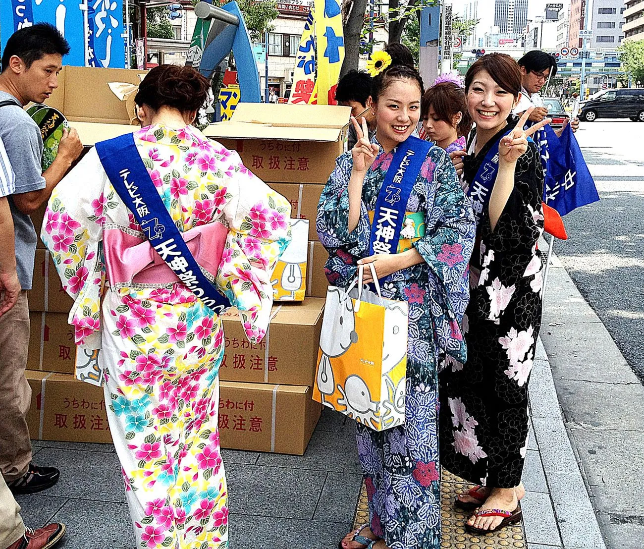 Girls prepare for the famous Tenjin Matsuri (festival) in Minami-Mirimachi,...
