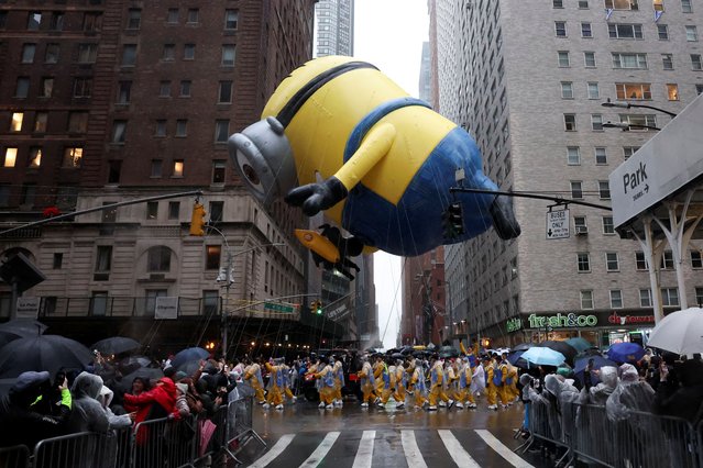 The Stuart the Minion balloon flies during the 98th Macy's Thanksgiving Day Parade in New York City on November 28, 2024. (Photo by Brendan McDermid/Reuters)