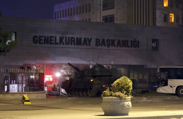 A tank is seen in front of the gate of the General Staff headquarters during an attempted coup in Ankara, Turkey July 16, 2016. (Photo by Reuters/Stringer)