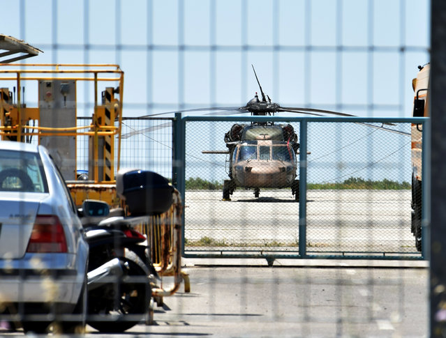A Turkish military helicopter lands in the northern Greek city of Alexandroupolis with eight men on board who have requested political asylum after the attempted coup in Turkey, July 16, 2016. (Photo by Panagiota Tsikaki/Reuters/Eurokinissi)
