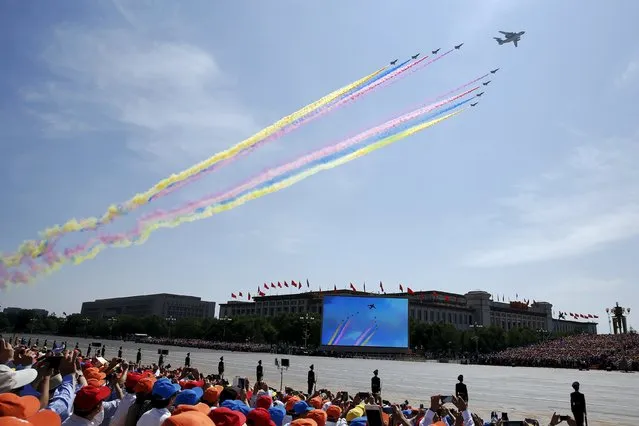 Military aircraft perform during the military parade marking the 70th anniversary of the end of World War Two, in Beijing, China, September 3, 2015. (Photo by Damir Sagolj/Reuters)
