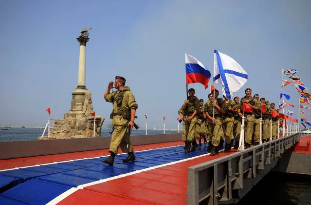 Russian marines parade during the Navy Day celebrations in Sevastopol, Crimea, July 31, 2016. (Photo by Pavel Rebrov/Reuters)