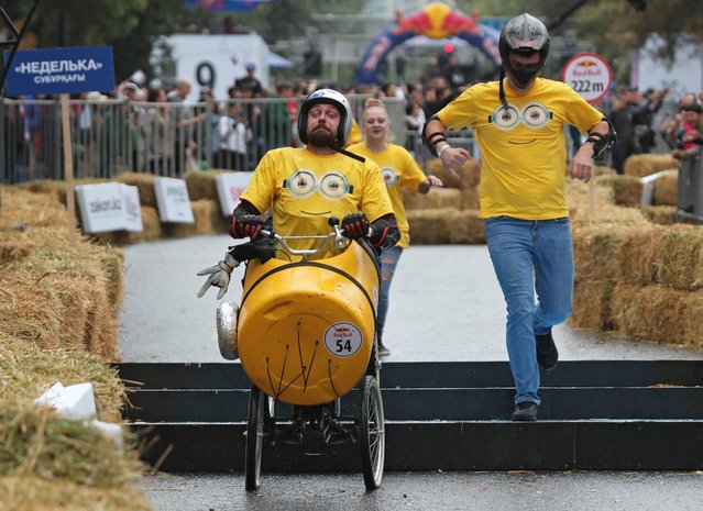 A competitor drives his homemade vehicle without an engine during the Red Bull Soapbox Race in Almaty, Kazakhstan on September 11, 2022. (Photo by Pavel Mikheyev/Reuters)