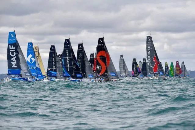 Sail boats take the start of the 51st edition of La Solitaire du Figaro solo sailing race on August 30, 2020, off the coast of Saint-Quay-Portrieux, in Saint-Brieuc Bay, northwestern France, in the first stage of the race. The 35 solo skippers will sail 520 nautical miles in the 1st stage of 4 legs. Leg 1 starts at Saint-Brieuc to Saint-Brieuc, a 642-mile voyage to the Fastnet and back. (Photo by Loic Venance/AFP Photo)
