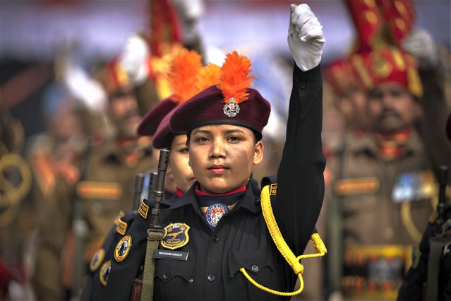 A contingent of Veerangana, Assam police woman commandos, take part in a Republic Day parade in Guwahati, India, Thursday, January 26, 2023. (Photo by Anupam Nath/AP Photo)