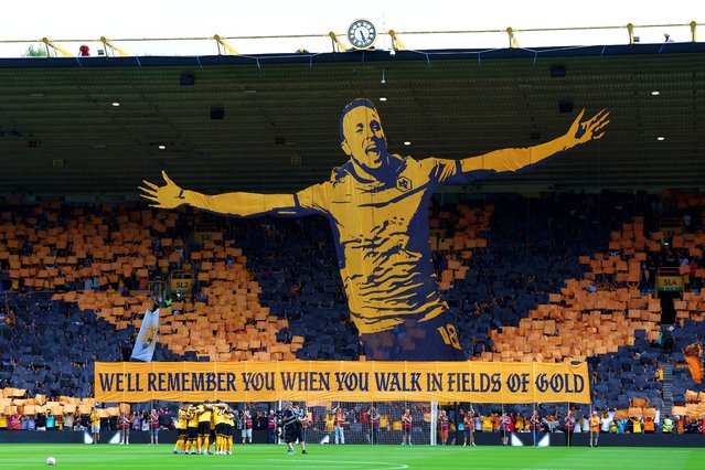 A giant tifo of ex-Wolverhampton Wanderers player Diogo Jota is seen ahead of the Premier League match between Wolverhampton Wanderers and Manchester City at Molineux on August 16, 2025 in Wolverhampton, England. (Photo by Chris Brunskill/Fantasista/Getty Images)