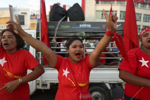 Supporters dance during a National League for Democracy (NLD) party campaign rally in Yangon November 5, 2015. (Photo by Soe Zeya Tun/Reuters)
