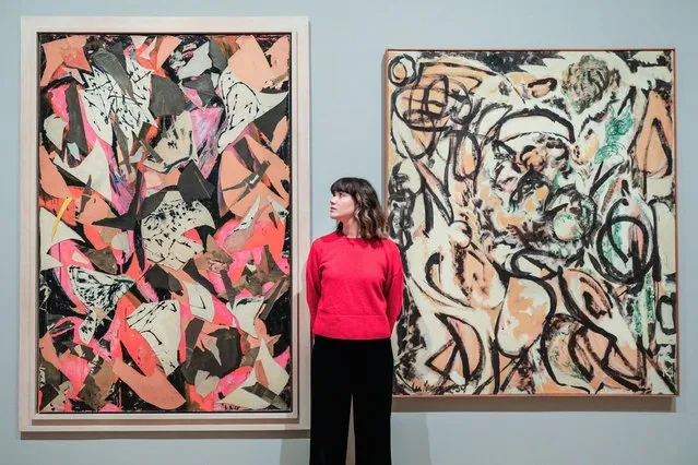 Gallery staff with Lee Krasner's “Bald Eagle” (1955) and “Feathering” (1959) in London on February 8, 2023. Whitechapel Gallery unveils its new exhibition, “Action, Gesture, Paint: Women Artists and Global Abstraction 1940 – 70”, with over 150 paintings by an overlooked generation of 80 international women artists. (Photo by Imageplotter/Alamy Live News)