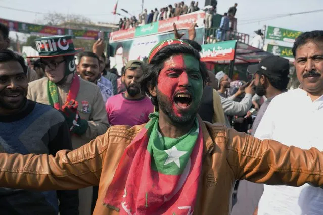 Supporters of Pakistan's former prime minister Imran Khan's “Pakistan Tehreek-e-Insaf” party participate in a rally, in Lahore, Pakistan, Wednesday, February 22, 2023. (Photo by K.M. Chaudary/AP Photo)