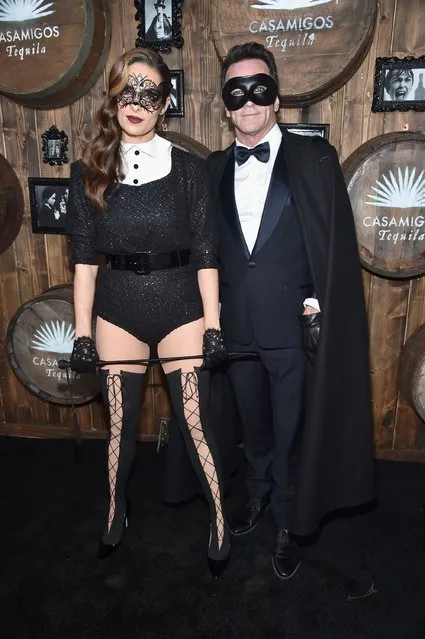 Television personality Jeff Probst (R) and Lisa Ann Russell arrive to the Casamigos Halloween Party at a private residence on October 28, 2016 in Beverly Hills, California. (Photo by Alberto E. Rodriguez/Getty Images for Casamigos Tequila)